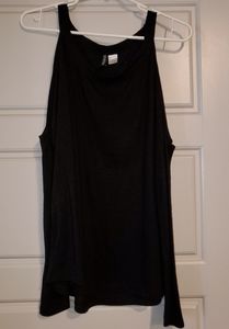 Black long sleeve shoulder showing shirt.